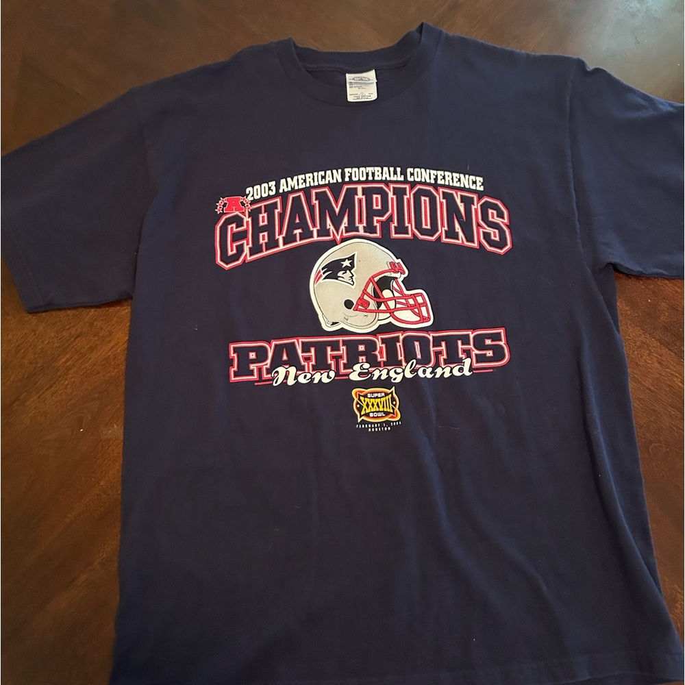 2003 patriots Super Bowl shirt on a delta pro weights tag